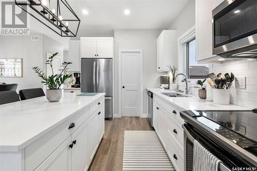 234 Dubois Crescent, Saskatoon, SK - Indoor Photo Showing Kitchen With Double Sink With Upgraded Kitchen