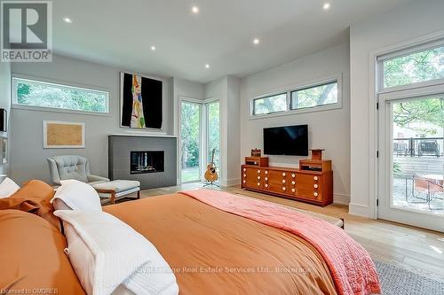 1250 Braeside Drive, Oakville (1011 - Mo Morrison), ON - Indoor Photo Showing Bedroom With Fireplace