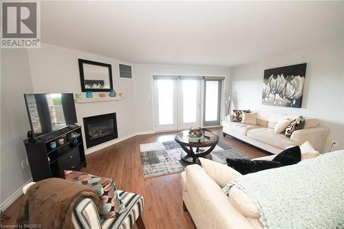 401 Birmingham Street E Unit# 305, Mount Forest, ON - Indoor Photo Showing Living Room With Fireplace