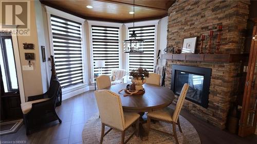 189 Pine Street, Sturgeon Falls, ON - Indoor Photo Showing Dining Room With Fireplace