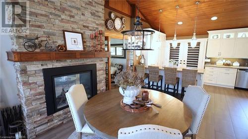 189 Pine Street, Sturgeon Falls, ON - Indoor Photo Showing Dining Room With Fireplace