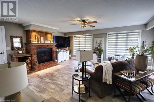 189 Pine Street, Sturgeon Falls, ON - Indoor Photo Showing Living Room With Fireplace