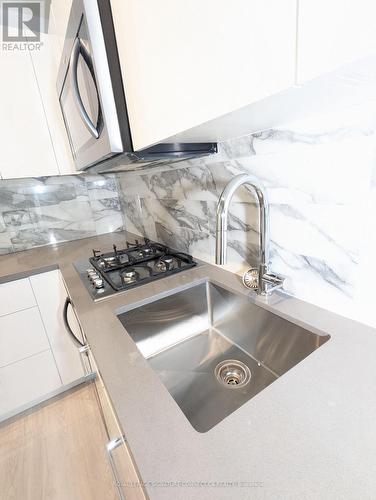 409 - 195 Mccaul Street, Toronto, ON - Indoor Photo Showing Kitchen With Double Sink