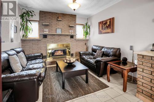 4457 Fourth Avenue, Niagara Falls, ON - Indoor Photo Showing Living Room With Fireplace