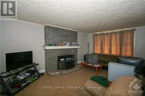 9 Cockburn Street, North Stormont, ON - Indoor Photo Showing Living Room With Fireplace