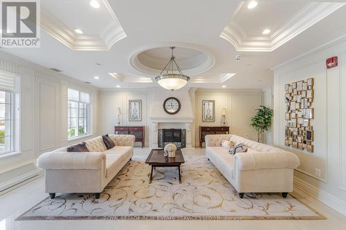 206 - 2300 Upper Middle Road, Oakville, ON - Indoor Photo Showing Living Room With Fireplace