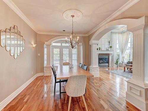 Salle Ã  manger - 3885 Rue Leningrad, Brossard, QC - Indoor Photo Showing Dining Room With Fireplace