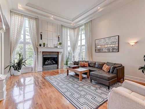 Salon - 3885 Rue Leningrad, Brossard, QC - Indoor Photo Showing Living Room With Fireplace