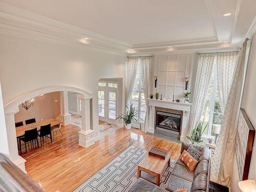 Salon - 3885 Rue Leningrad, Brossard, QC - Indoor Photo Showing Living Room With Fireplace