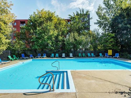 Pool - 301-196 Rue Gary-Carter, Montréal (Villeray/Saint-Michel/Parc-Extension), QC - Outdoor With In Ground Pool With Backyard