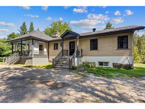 Backyard - 1613  - 1615 Ch. Du Village, Saint-Adolphe-D'Howard, QC - Outdoor With Deck Patio Veranda With Facade