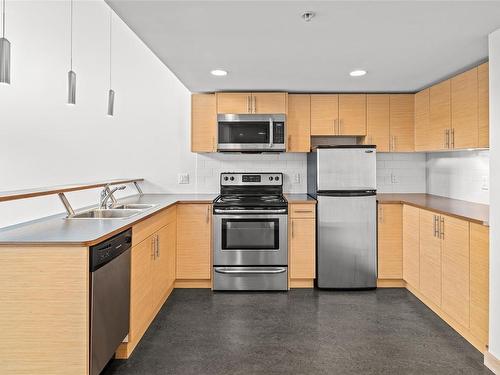 402-787 Tyee Rd, Victoria, BC - Indoor Photo Showing Kitchen With Double Sink