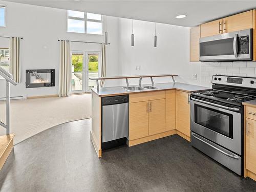 402-787 Tyee Rd, Victoria, BC - Indoor Photo Showing Kitchen With Double Sink