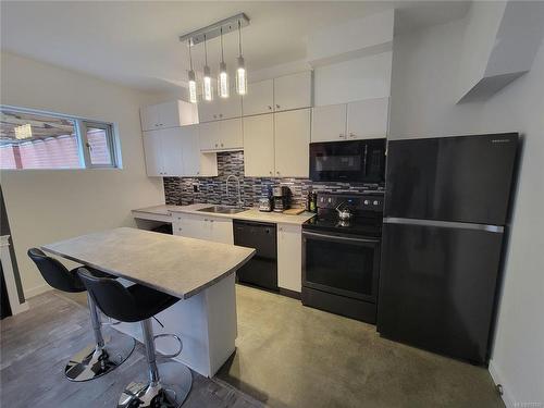 110-932 Johnson St, Victoria, BC - Indoor Photo Showing Kitchen