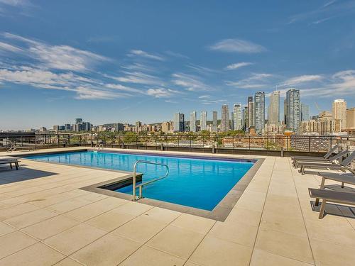 Pool - 801-1485 Rue Des Bassins, Montréal (Le Sud-Ouest), QC - Outdoor With In Ground Pool With View