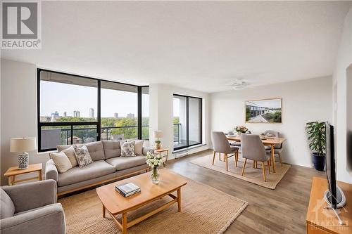 This photo has been virtually staged. - 99 Holland Avenue Unit#705, Ottawa, ON - Indoor Photo Showing Living Room