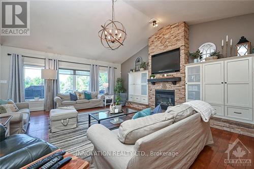 7042 Third Line Road S, Ottawa, ON - Indoor Photo Showing Living Room With Fireplace