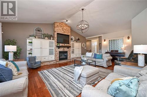 7042 Third Line Road S, Ottawa, ON - Indoor Photo Showing Living Room With Fireplace