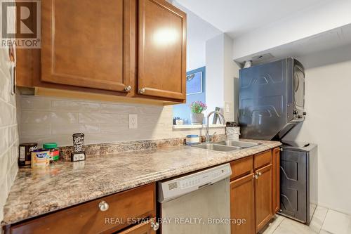 612 - 3077 Weston Road N, Toronto, ON - Indoor Photo Showing Kitchen With Double Sink