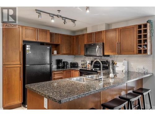 1093 Sunset Drive Unit# 105, Kelowna, BC - Indoor Photo Showing Kitchen With Double Sink