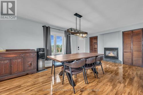 8029 Silver Street, West Lincoln, ON - Indoor Photo Showing Dining Room With Fireplace