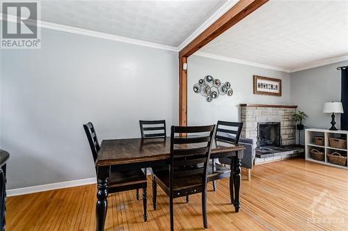 3722 Louiseize Road, Ottawa, ON - Indoor Photo Showing Dining Room With Fireplace