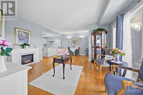 A - 1105 Stittsville Main Street, Ottawa, ON - Indoor Photo Showing Living Room With Fireplace