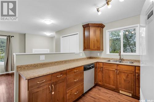 132B 110Th Street W, Saskatoon, SK - Indoor Photo Showing Kitchen With Double Sink