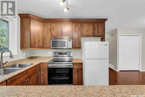 132B 110Th Street W, Saskatoon, SK - Indoor Photo Showing Kitchen With Double Sink