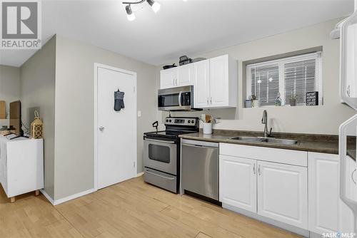 132B 110Th Street W, Saskatoon, SK - Indoor Photo Showing Kitchen With Double Sink