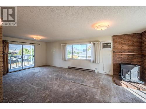 1448 Darmouth Street, Penticton, BC - Indoor With Fireplace