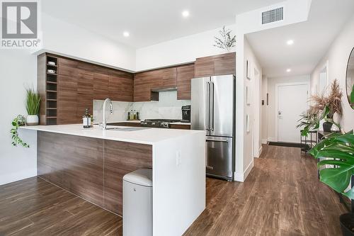 1925 Enterprise Way Unit# 202, Kelowna, BC - Indoor Photo Showing Kitchen With Stainless Steel Kitchen