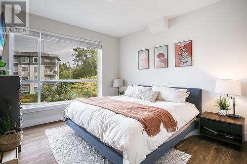 1925 Enterprise Way Unit# 202, Kelowna, BC - Indoor Photo Showing Bedroom