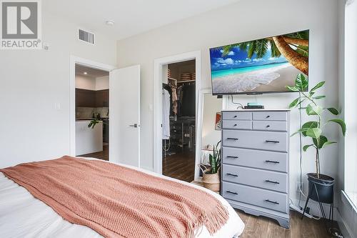 1925 Enterprise Way Unit# 202, Kelowna, BC - Indoor Photo Showing Bedroom