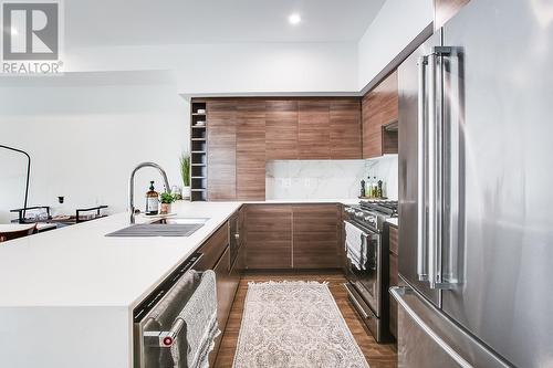 1925 Enterprise Way Unit# 202, Kelowna, BC - Indoor Photo Showing Kitchen With Stainless Steel Kitchen With Upgraded Kitchen