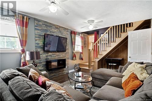 5 Alswood, Shediac River, NB - Indoor Photo Showing Living Room With Fireplace