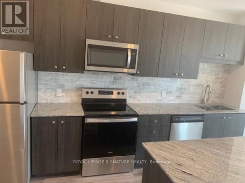 1602 - 104 Garment Street, Kitchener, ON - Indoor Photo Showing Kitchen With Double Sink With Upgraded Kitchen