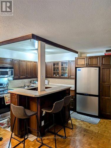 209 - 180 Markham Road, Toronto, ON - Indoor Photo Showing Kitchen