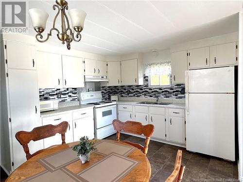 5435 Rte 117, Baie-Sainte-Anne, NB - Indoor Photo Showing Kitchen With Double Sink