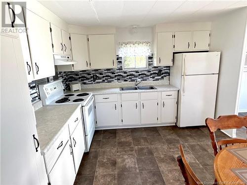 5435 Rte 117, Baie-Sainte-Anne, NB - Indoor Photo Showing Kitchen With Double Sink