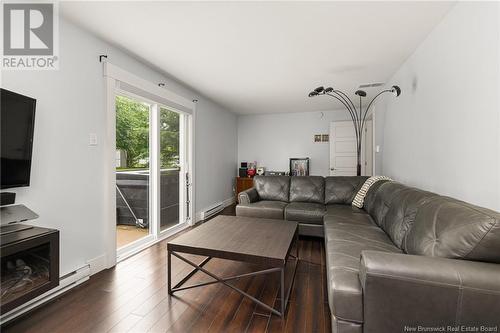 20 Glengrove, Moncton, NB - Indoor Photo Showing Living Room With Fireplace