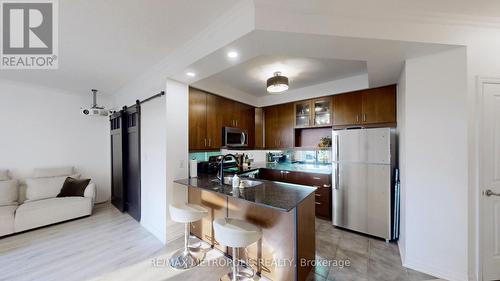 301 - 245 Dalesford Road, Toronto, ON - Indoor Photo Showing Kitchen