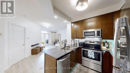 301 - 245 Dalesford Road, Toronto, ON - Indoor Photo Showing Kitchen With Double Sink