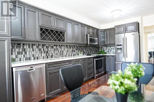 149 - 9800 Mclaughlin Road, Brampton, ON - Indoor Photo Showing Kitchen With Stainless Steel Kitchen With Upgraded Kitchen