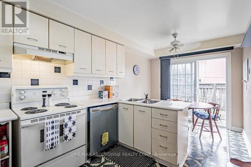 14 - 27 Hartnell Square, Brampton, ON - Indoor Photo Showing Kitchen With Double Sink