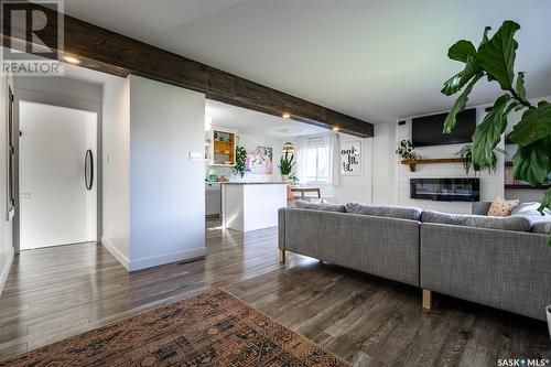 3229 Mountbatten Street, Saskatoon, SK - Indoor Photo Showing Living Room With Fireplace