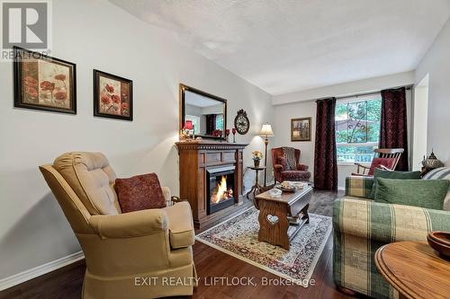 10 Climie Court, Clarington (Bowmanville), ON - Indoor Photo Showing Living Room With Fireplace