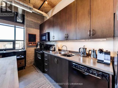 315 - 68 Broadview Avenue, Toronto, ON - Indoor Photo Showing Kitchen With Double Sink