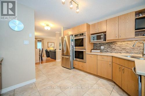 73 Finnie Lane, Centre Wellington, ON - Indoor Photo Showing Kitchen With Double Sink