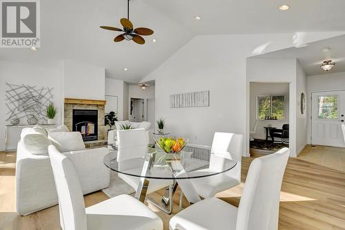 10541 Westshore Road, Vernon, BC - Indoor Photo Showing Dining Room With Fireplace